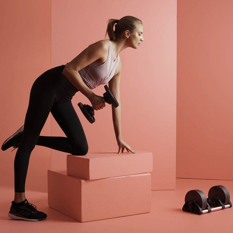 Adjustable dumbbells with various adjustment systems for the home gym